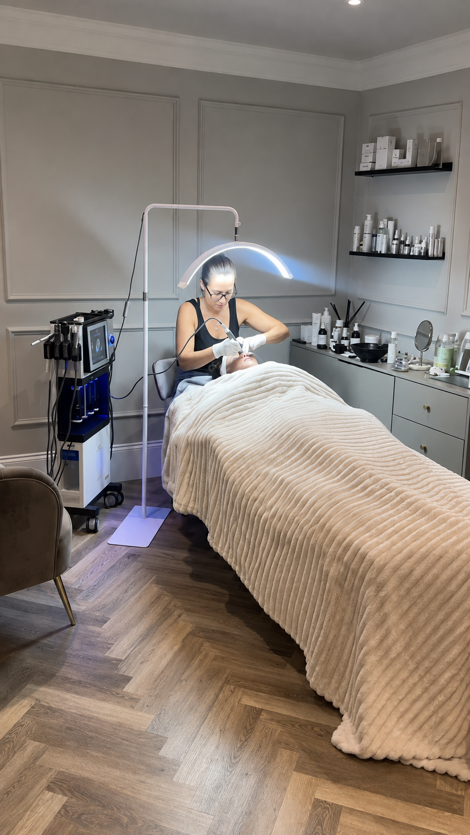 The Skin Lux treatment room during a facial treatment